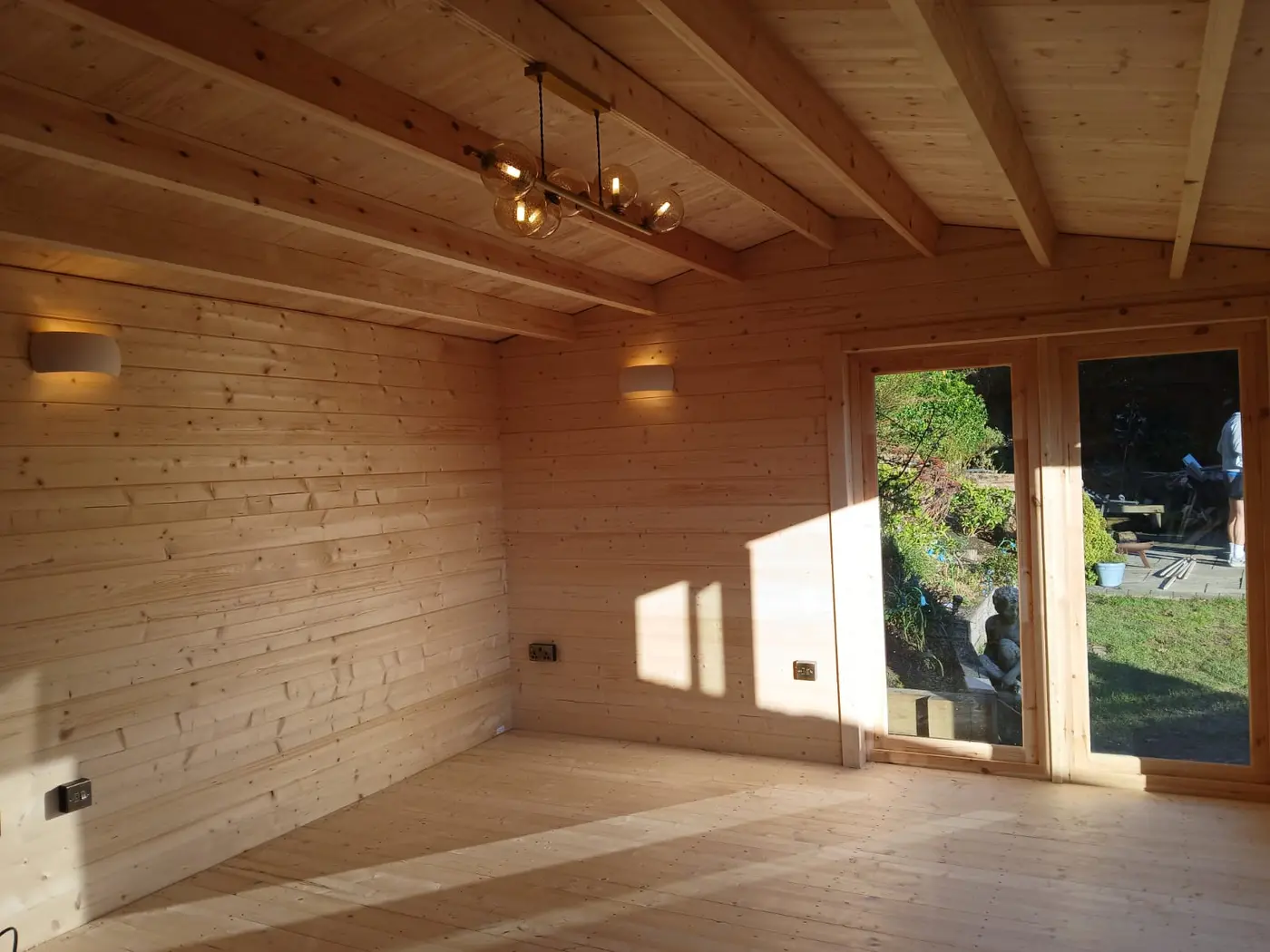 Finished timber-lined garden room interior